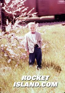 A Boy in his Sunday Best with Boxcar