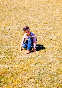 Boy On Grass