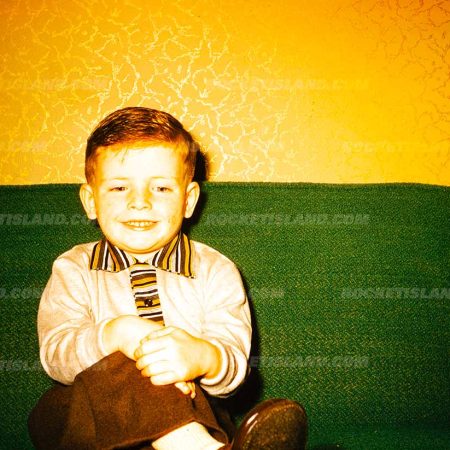 Boy on Green Couch