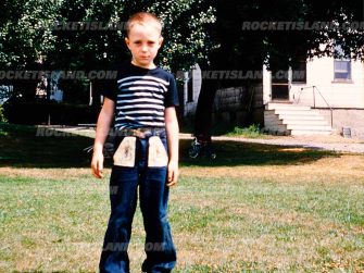 Boy On Grass During Summer